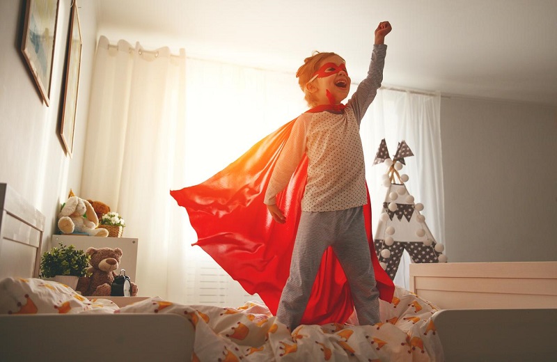 Child in super hero outfit